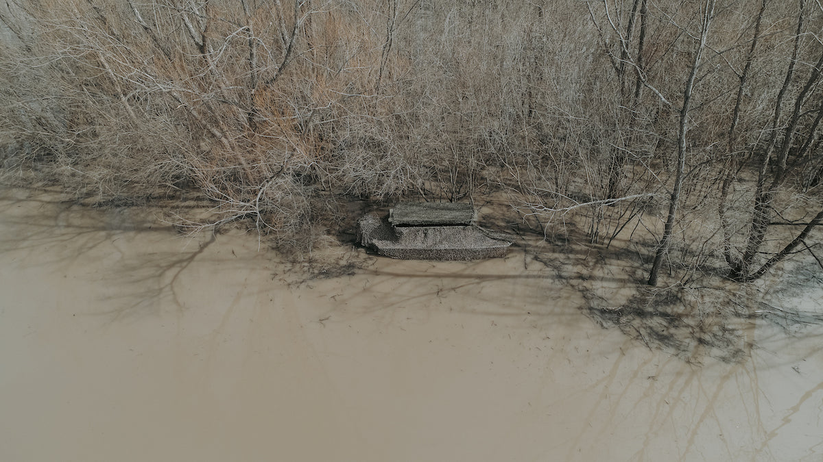 Banded AXE Boat/Shore Combo Blind enviro shot in use while duck hunting and goose hunting drone overhead view - ducks view